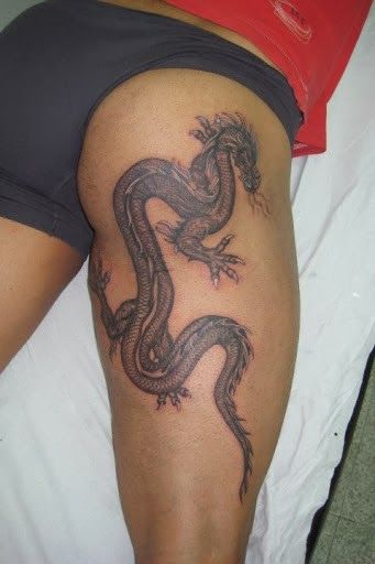dragon tattoo on leg